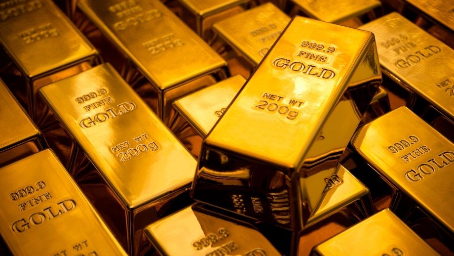 Oro record, dollaro forte e borse in calo