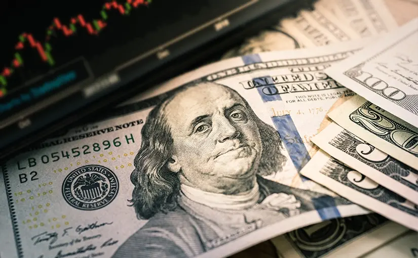 Dólar recupera após surpresa positiva nos dados laborais