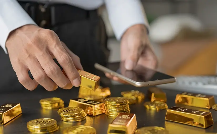 Fed mais dovish dá suporte ao ouro